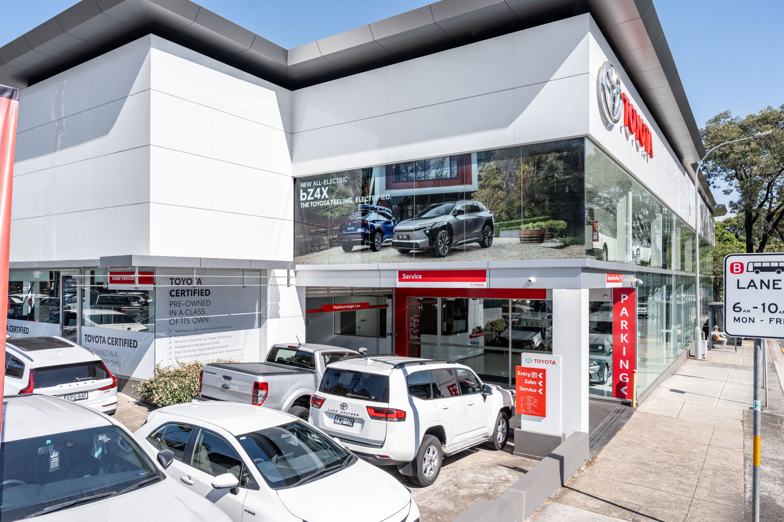 External building signage - WINDOW GRAPHICS ON TOP FLOOR WINDOWS AND GROUND FLOOR WINDOWS